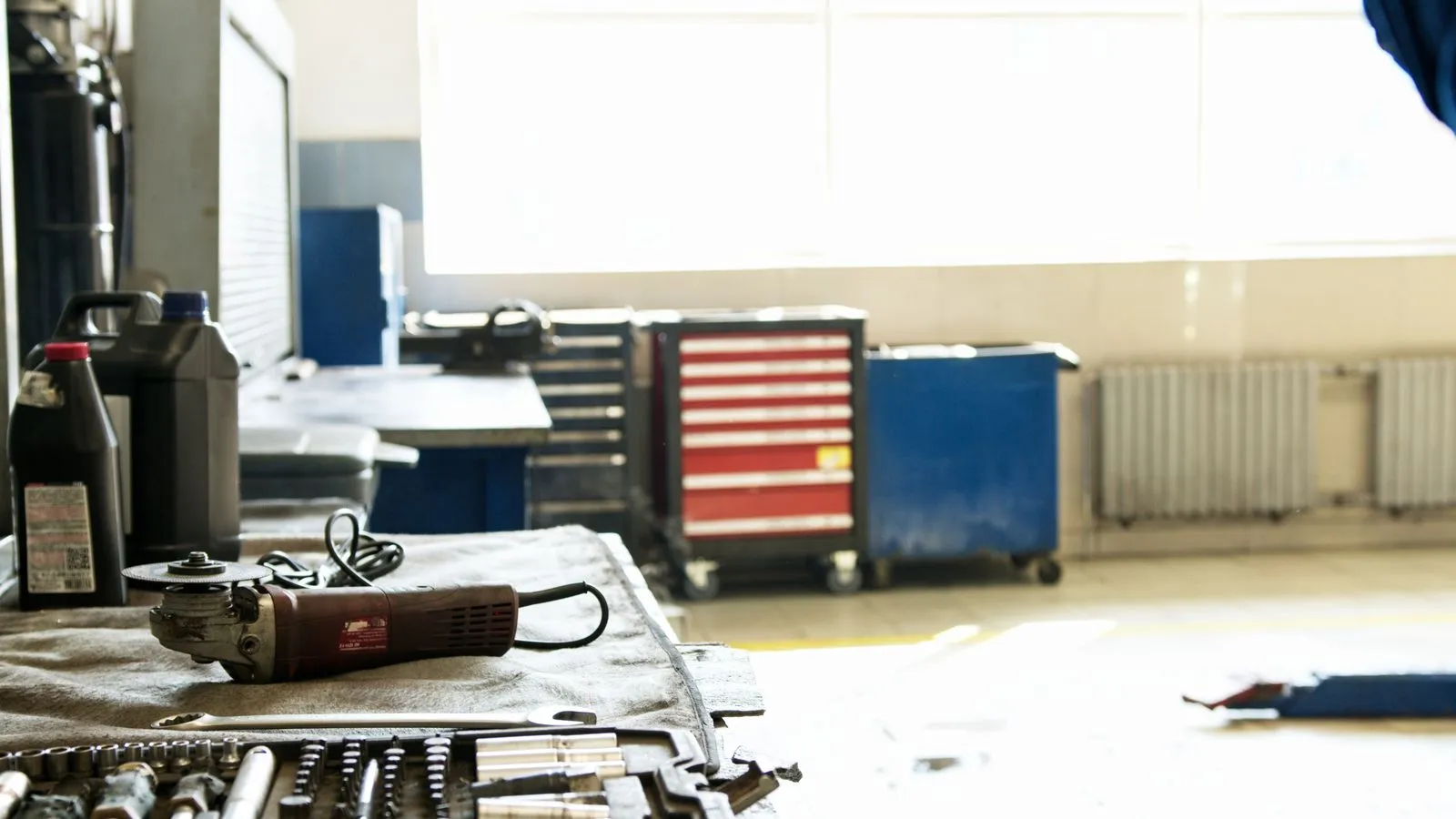 Organized workshop shelving with hand tools used for appliance repair